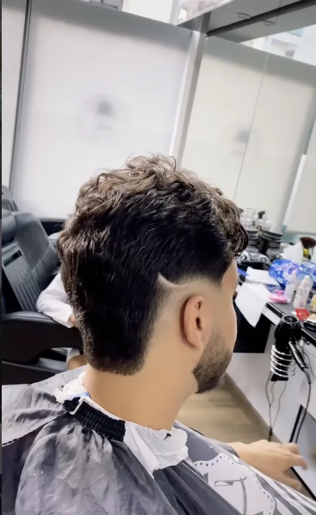 Coupe Low burst fade publiée par Mr Cut sur Instagram